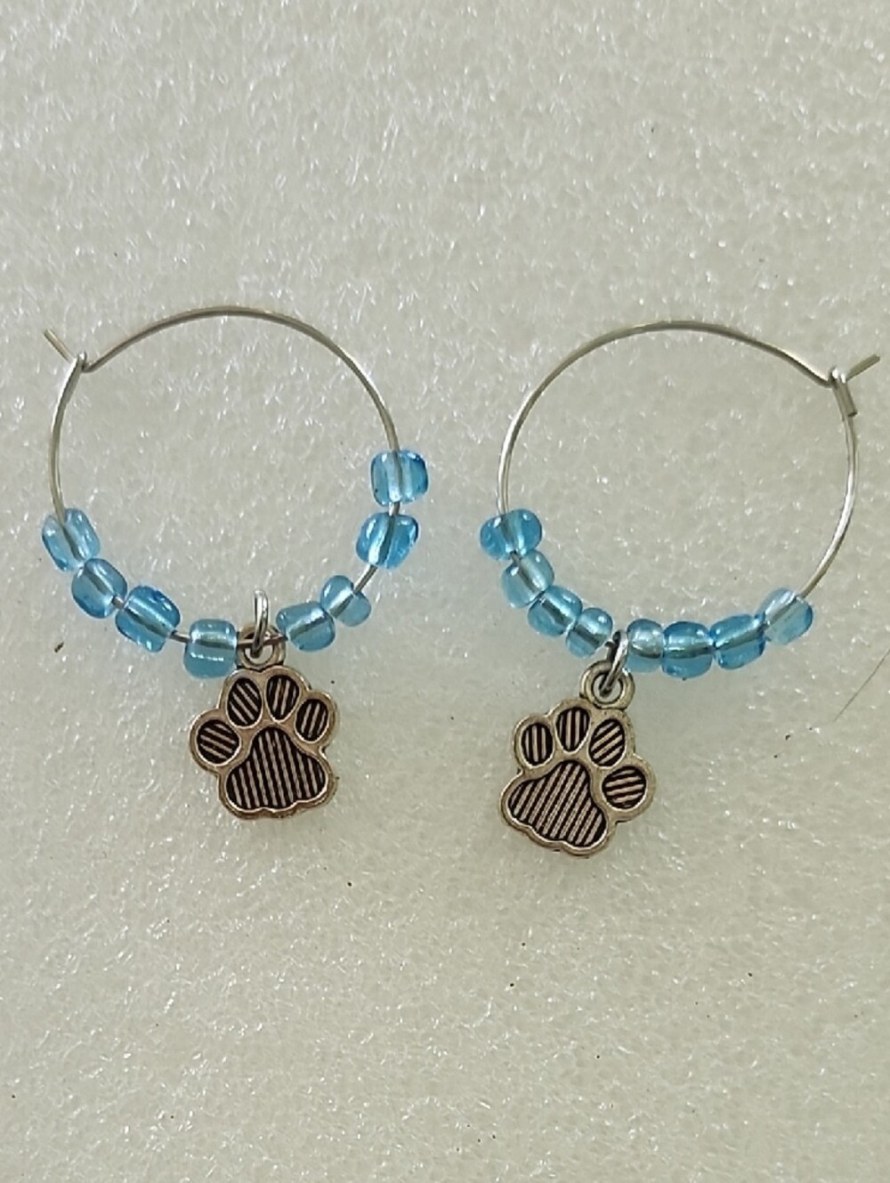 Hand Crafted Blue Beaded Hoop Earrings with Paw Charms